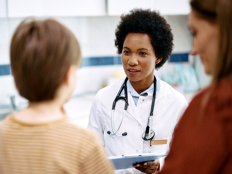Doctor Talking to Child and Mother Doctor Talking to Child and Mother