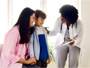 Doctor Talking With Family After Evaluation